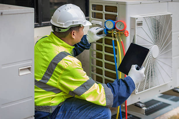 Professional Air Conditioning Repair technician working in Fort Branch, IN